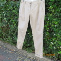 Fashion low rise skinny leg beige 100% cotton pants. Size 32 by INSYNC Casual. Front pockets.As new.