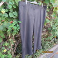 Smart grey/black mottled polyrayon stretch size 46 pants. Two tiny front pockets. WOOLWORTHS.