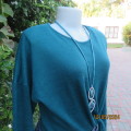 Pretty soft warm acrylic knit long sleeve  top with stretch. Straps to tie on front. Size 38. As new