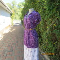 Striking 100% cotton animal print capped sleeve button down top in purples. Size 38 by LEGIT.