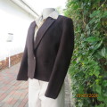 As new wool blend brown jacket with herringbone pattern size 32.34 by MANHATTAN. Fully lined.