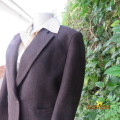 As new wool blend brown jacket with herringbone pattern size 32.34 by MANHATTAN. Fully lined.