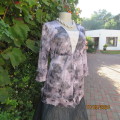 Sheer stretch poly coverup in grey floral colours. Size 36 by EVES  LEAVES. Open front/tiestrings.