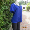 Statement top in royal blue by WOOLWORTHS size 40. Shiny,silky poly front. Stretch poly back.As new.