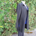 Smart long black jacket/top. Long cuffed sleeves. Size 40. Button down/open collar. New conditon.
