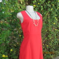 Plain red textured polycotton empire style sleeveless dress. Double fabric top. Size 36. Back zip.