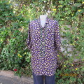 Charming navy silky polyester top with cream/blue small floral pattern.Size 44.Short sleeves. As new