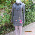 Warm acrylic knit extra long mottled grey tunic style top with poloneck. Size 34.Floral embroidery.