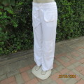 Top of the range white polyester straight legged pants by NINE to SIX  L.A. size 40. Pockets galore.