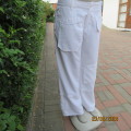 Top of the range white polyester straight legged pants by NINE to SIX  L.A. size 40. Pockets galore.