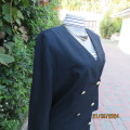 Elegant double breast black viscose/polyester long sleeve all seasons jacket. Size 36 by WOOLWORTHS.