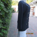 Elegant double breast black viscose/polyester long sleeve all seasons jacket. Size 36 by WOOLWORTHS.