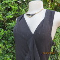 Amazing black sleeveless stretch polyester dress with glam pattern.Size 40 by REITMANS Canada.As new