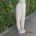 Beautiful lemonade pink nylon pajama pants with acrylic lace hems.Elastic waist. Size 40. As new