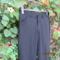 Very black Men`s poly/viscose light weight pants by CIGNAL size 32. Back flap pockets. Brand new con