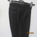 Very black boy`s poly/viscose dress pants by CIGNAL size 28/71cm. Pockets back/sides. Brand new cond