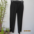Very black boy`s poly/viscose dress pants by CIGNAL size 28/71cm. Pockets back/sides. Brand new cond