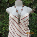 Sweet rich cream top with rust/grey stripes. Shoestring straps. Size 30 by REFINERY.Fold over.As new