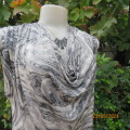 Glamour shiny top in cream/black/grey animal print. Stretch polyester.Cowl neckline.By OASIS size 40