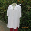 Top of the line DONNA CLAIRE size 46/22 white short sleeve top. Embroidered collar. As new.