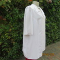 Top of the line DONNA CLAIRE size 46/22 white short sleeve top. Embroidered collar. As new.