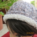 High quality grey with silver metallic fibre beanie and warm cream inner. Medium size. As new.