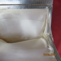 Lovely little white vintage evening bag with silver closure/chain. Size 17cm x 14.5cm. Ivory band.