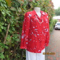 Fired up in red! Cherry red long sleeve polyester blouse with white/black floral pattern, Size 36.