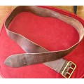 1978 POLICE ISSUED LEATHER BELT WITH BRASS BUCKLE.