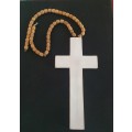 Huge wood cross with wooden beads.