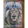Gareth Patterson. LAST OF THE FREE. Three young lions restored to the wild