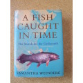 A FISH CAUGHT IN TIME  The Search for the Coelacanth  by Samantha Weinberg