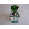 Lovely boxed faceted perfume bottle with green lid