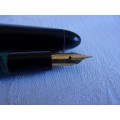 Vintage  no-name twist-filler fountain pen with a 14ct gold nib