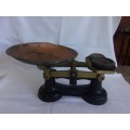Vintage cast iron balance scale with 2 Imperial weights