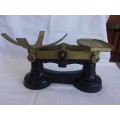 Vintage cast iron balance scale with 2 Imperial weights