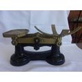 Vintage cast iron balance scale with 2 Imperial weights