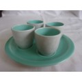 4 Vintage Poole Pottery egg cups with the tray