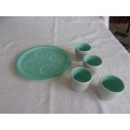 4 Vintage Poole Pottery egg cups with the tray
