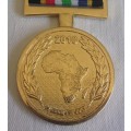 2010 gold plated SAPS Soccer World Cup Support medal with ribbon
