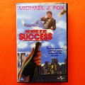 The Secret of My Success - Michael J Fox - Movie VHS Tape (1987)