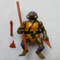1988 Teenage Mutant Ninja Turtles - Donatello Figure with some Weapons