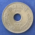 Palestine 10 Mils 1937 error off center hole.