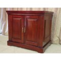 Fantastic and stunningly made double door mahogany cabinets on castors - ideal minibar in guest room