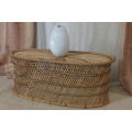 A BEAUTIFULLY MADE OVAL WICKER CENTRE/ OCCASIONAL TABLE WITH CONTRAST STITCH DETAILING