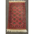 A BEAUTIFUL DEEP RED PERSIAN CARPET/ MAT (1m x 58cm)  - THE IDEAL BEDSIDE CARPET