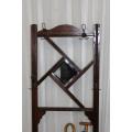 AN SUPERB ANTIQUE OAK HALL STAND WITH BEAUTIFUL METAL HOOKS AND A BEVELLED MIRROR