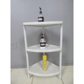 A LOVELY PLASTIC CORNER STAND (OR PLANT STAND)! VERY VERSATILE AROUND THE HOME!!