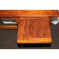 A STUNNING ANTIQUE SOLID TEAK THREE-DRAWER COMPACT OFFICE DESK WITH A PULL-OUT WORK SURFACE