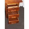 A STUNNING ANTIQUE SOLID TEAK THREE-DRAWER COMPACT OFFICE DESK WITH A PULL-OUT WORK SURFACE